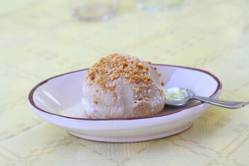 Tartufo - traditional ice cream with liquid filling in local restaurant, South Italy, Calabria