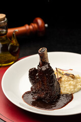 Braised Lamb Shanks, Stinco di agnello vitello brasato with sauce and risotto