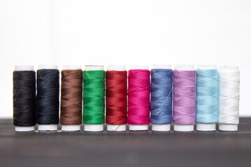 Threads. Spools of multi-colored threads. Sewing concept