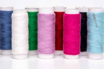 Threads. Spools of multi-colored threads. Sewing concept