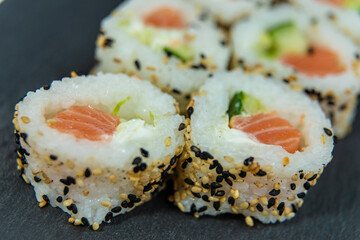 Uramaki on dark surface
