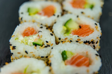 Uramaki on dark surface