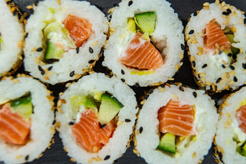 Uramaki on dark surface