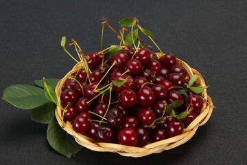 Sweet ripe cherry with leaves