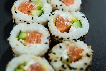 Uramaki on dark surface