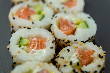 Uramaki on dark surface