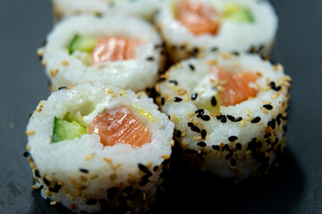 Uramaki on dark surface
