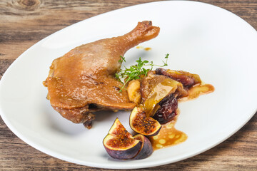Roasted. duck. leg with plum and apple