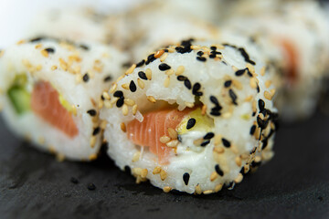 Uramaki on dark surface