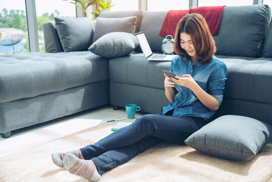 Banner Asian Woman Using Smartphone Reading Online Social Media Shopping Online Website On Smartphone With Smile Face. Happiness Asian Woman Holding Cellphone Checking Mail Read Blog Vlog Social Media