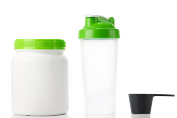 Green protein shaker, scoop and jar