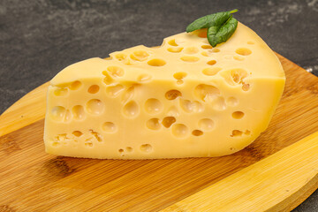 Maasdam cheese - yellow triangle with holes