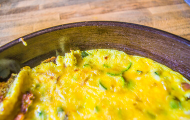 Omelet with eggs, zucchini and cheese