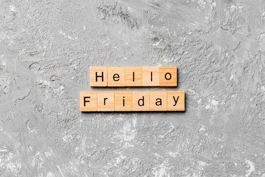 hello friday word written on wood block. hello friday text on cement table for your desing, concept