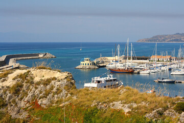 Sea pier in Tropea, resort in South Italy, Calabria, summer seascape with yachts and boats