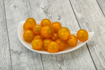 Fresh yellow cherry tomato heap