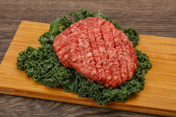 Raw beef burger cutlet for cooking