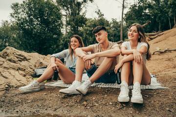 Friends enjoying a picnic day in nature.