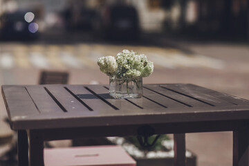 flower bouquet in a vase in cafe.