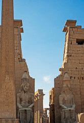 Statues at entrance to ancient egyptian temple