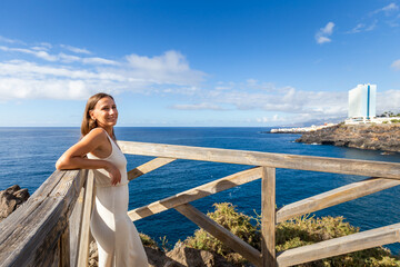 Young woman enjoying walking on Tenerife coast