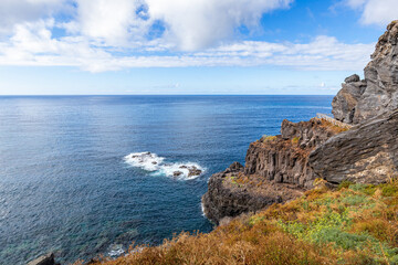Volcanic cliff on the Tenerife coast of Atlantic ocean