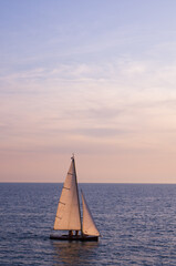 Fototapeta premium Seascape with beautiful warm light after a storm in forte dei marmi, italy