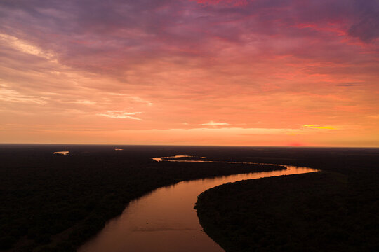Sunset reflection over the Cuiaba river, Pantanal, Brazil  