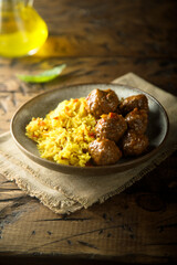 Homemade meatballs with spicy rice