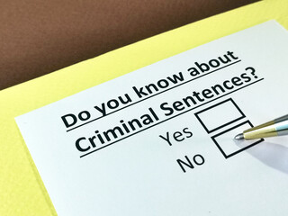 Obraz premium One person is answering question about criminal sentences.