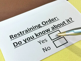 Obraz premium One person is answering question about restraining order.