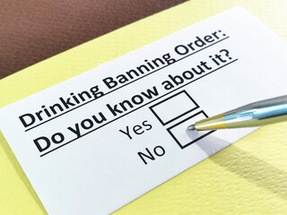 Obraz premium One person is answering question about drinking banning order.