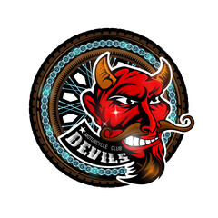Devil's head in center of motorcycle wheel, color label on white