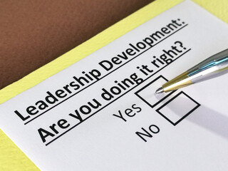Fototapeta premium One person is answering question about leadership development.