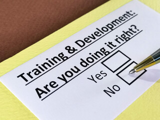 Obraz premium One person is answering question about training and development.
