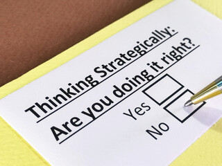 Obraz premium One person is answering question about thinking strategically.