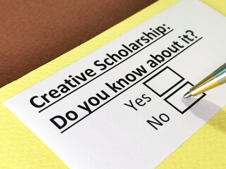 Obraz premium One person is answering question about creative scholarship.