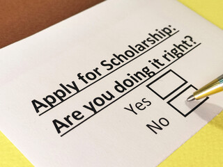 Obraz premium One person is answering question about scholarship application.