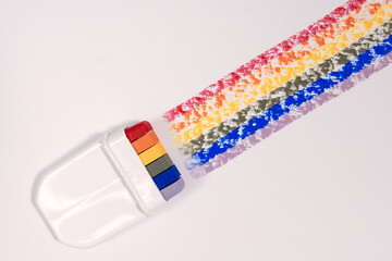 Rainbow lgbt flah painted in a white paper with a fan brush 