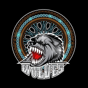 Wolf's head in center of motorcycle wheel, color label on black