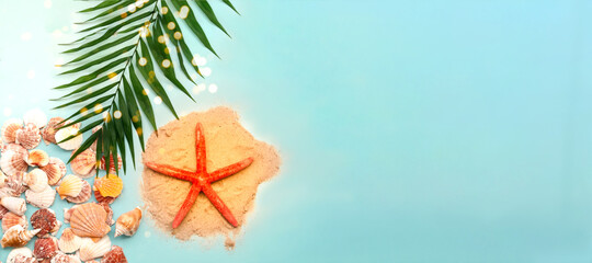 Fototapeta na wymiar Red starfish against the background of seashells. Summer time or hello summer. Creative copy space
