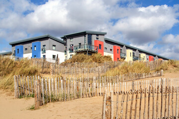 Fototapeta premium Beach side Apartments with balconies and fabulous ocean views at Swansea Bay on the SA1 development - UK