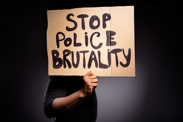 Profile side photo of afro american guy hold banner stop police brutality close cover hide head...