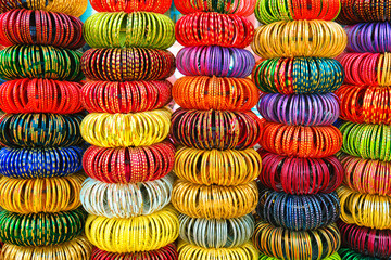 Fototapeta na wymiar Indian Bangles or wrist bracelets on sale in a Jewelery shop. Jodhpur, Rajasthan, India