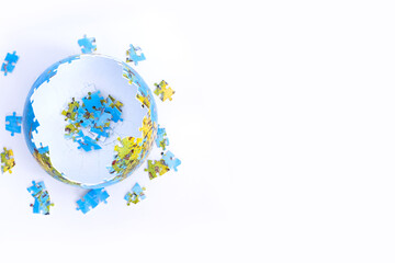 Earth globe puzzle reconstruction concept with planet model isolated on white background