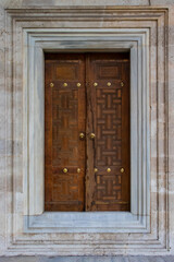 Historical brown door from Suleymaniye Mosque, Istanbul