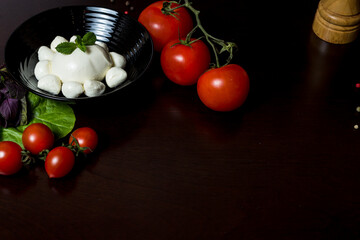Food Background. mozzarella cheese, lettuce, basil, tomatoes, vegetables, herbs.