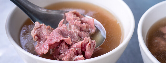 Beef soup - famous food in Taiwan, Asia, Asian Taiwanese street delicacy cuisine, close up, lifestyles, traditional breakfast in Tainan.
