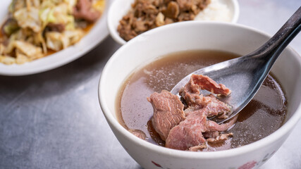 Beef soup - famous food in Taiwan, Asia, Asian Taiwanese street delicacy cuisine, close up, lifestyles, traditional breakfast in Tainan.