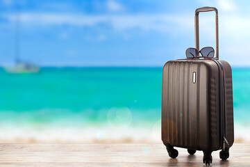 hand luggage suitcase on the beach